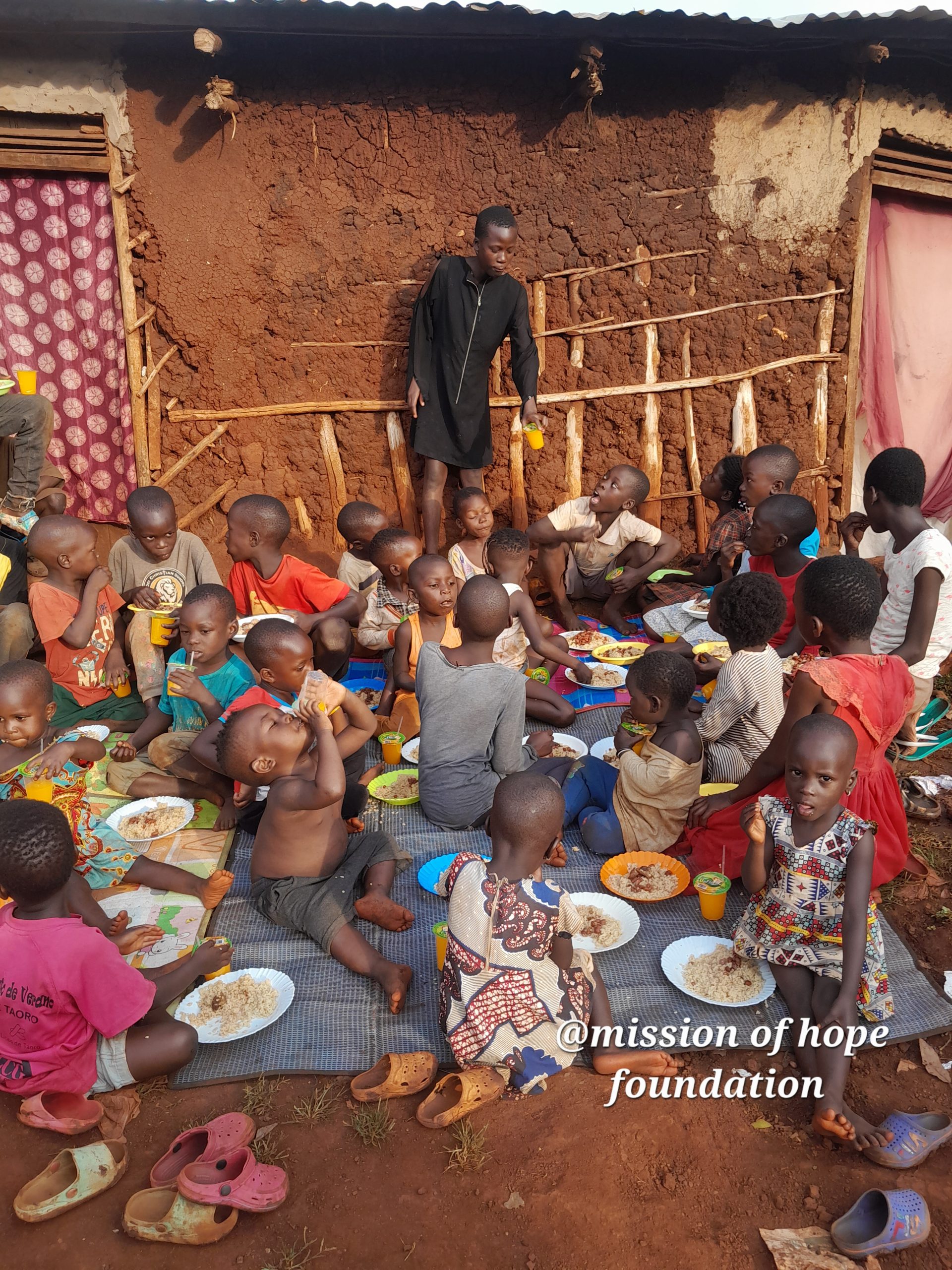 Children receiving food support from Mission of Hope Foundation Uganda.